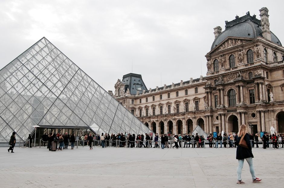Iconic French landmarks like the Eiffel Tower, Louvre Museum, and Palace of Versailles