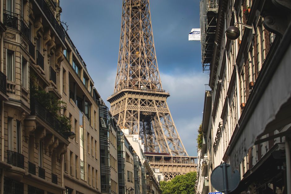 Iconic French landmarks like Eiffel Tower and Mont Saint-Michel, symbolizing a diverse travel itinerary
