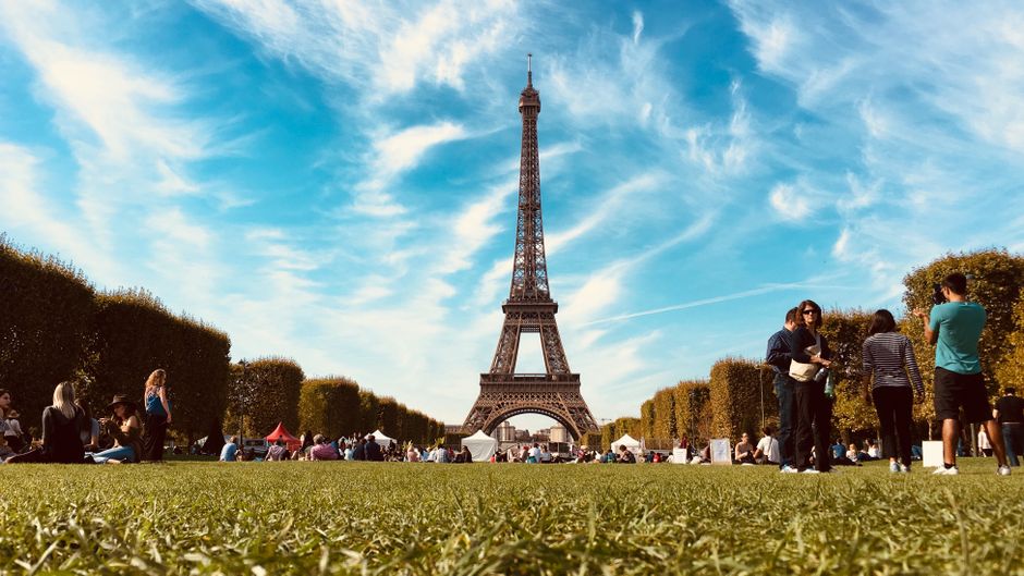 Tourist using a map app on a smartphone in Paris, France