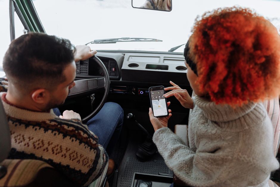 Tourist using a smartphone for navigation in a German city