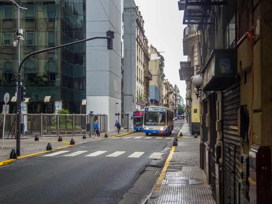 Traveler walking safely on a busy street in Buenos Aires, Argentina