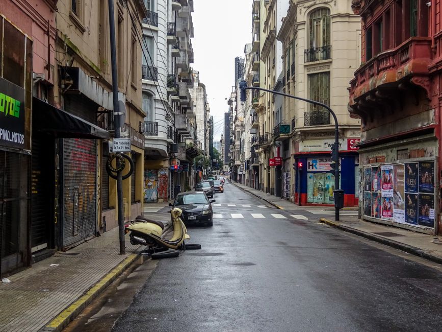 Vibrant shopping street in Buenos Aires, Argentina, with people browsing stores