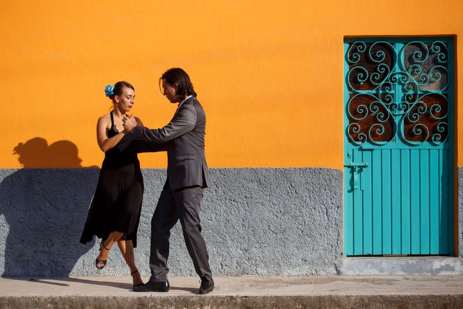 Couple performing tango in a vibrant show in Buenos Aires, Argentina