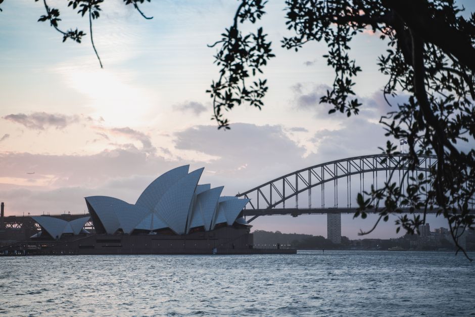 Panoramic view of Sydney Opera House and Harbour Bridge in Australia at sunset