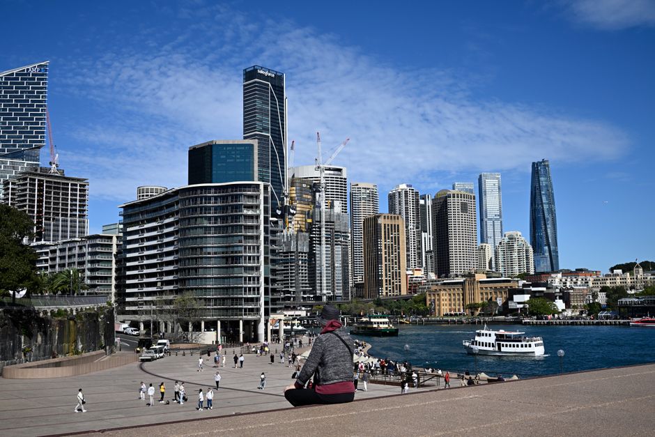 Budget traveler enjoying the vibrant Sydney cityscape in Australia