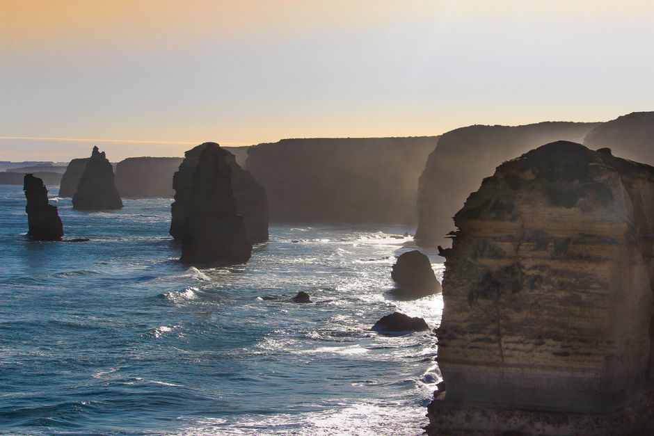 Sunset over the Twelve Apostles rock formations along Australia's Great Ocean Road