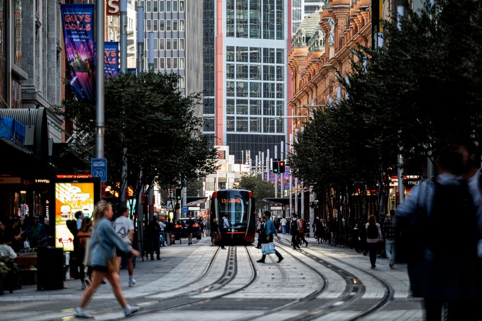 People enjoying shopping on a bustling street in an Australian city