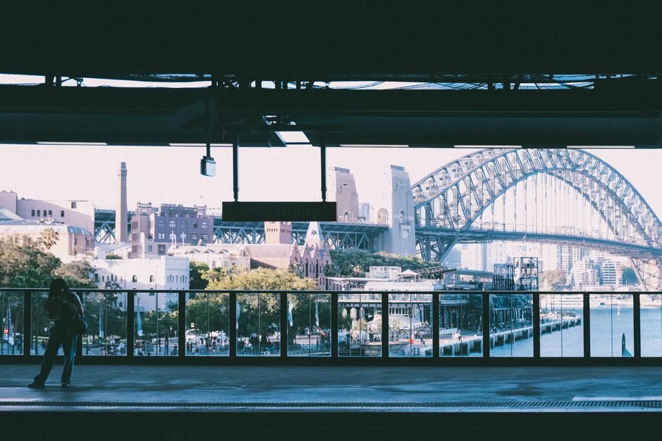 Busy Central Station in Sydney, Australia, with trains and commuters