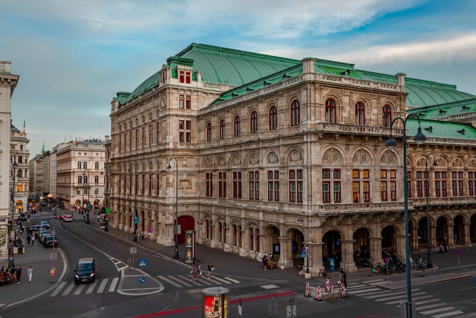 Historic Vienna cityscape with travelers enjoying Austria on a budget