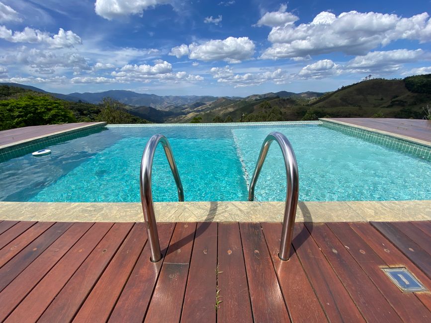 Charming pousada in Brazil with a swimming pool and lush tropical plants