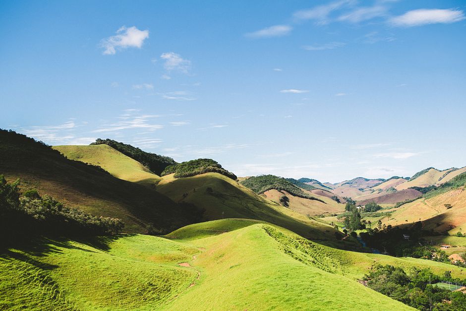 Panoramic view of diverse Brazilian landscapes, showcasing mountains, beaches, and rainforests