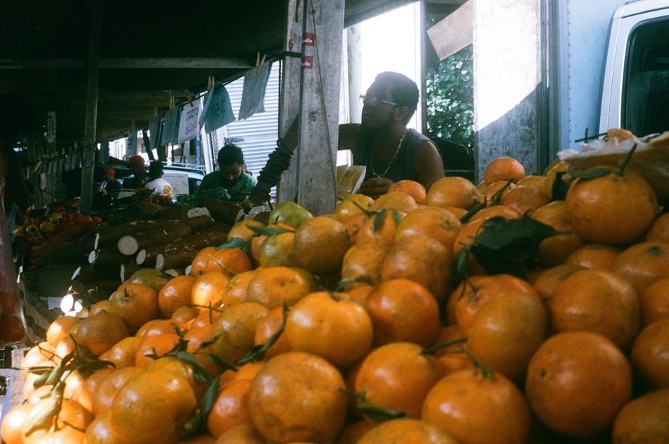 Colorful artisan market in Brazil with local crafts and people shopping