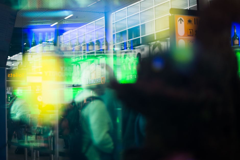 Travelers arriving at a bustling airport terminal in Brazil, ready for their transfer.