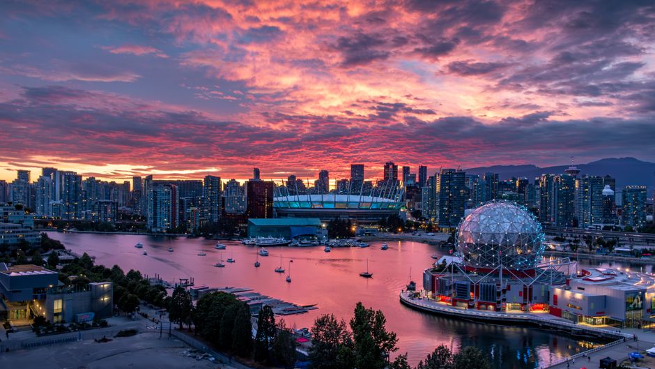 Vibrant Canadian cityscape at sunset, symbolizing travel and budget planning in Canada