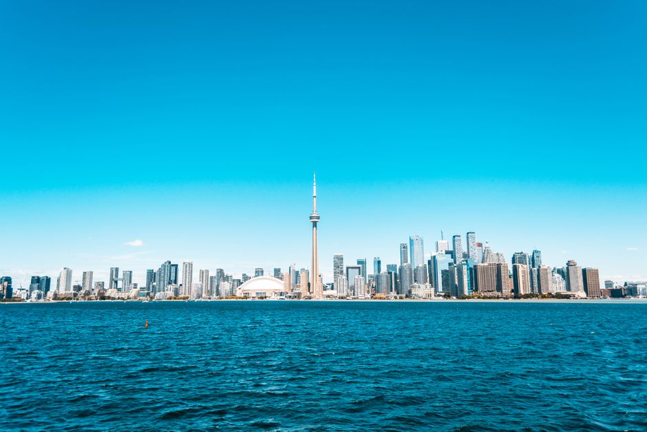 Scenic Canadian landscape showcasing diverse travel options like trains, ferries, and national parks.