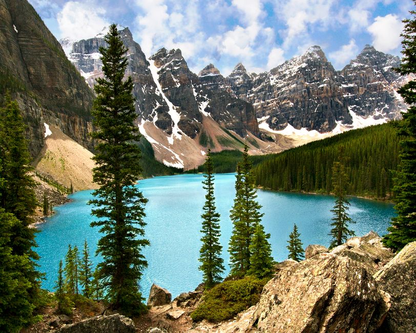 Group of travelers enjoying a scenic tour in the Canadian Rockies