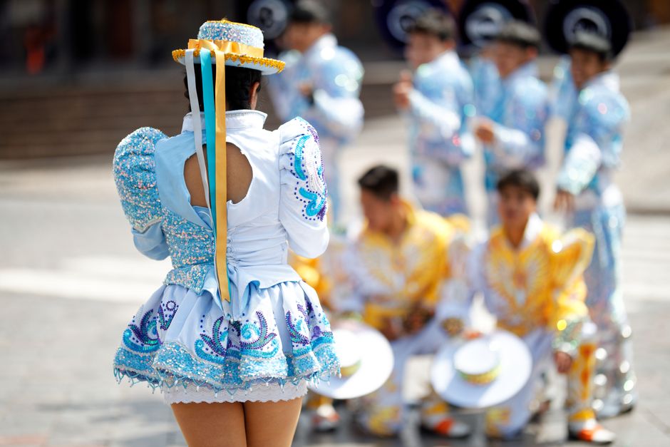 Couple performing traditional Cueca dance in Chile during Fiestas Patrias