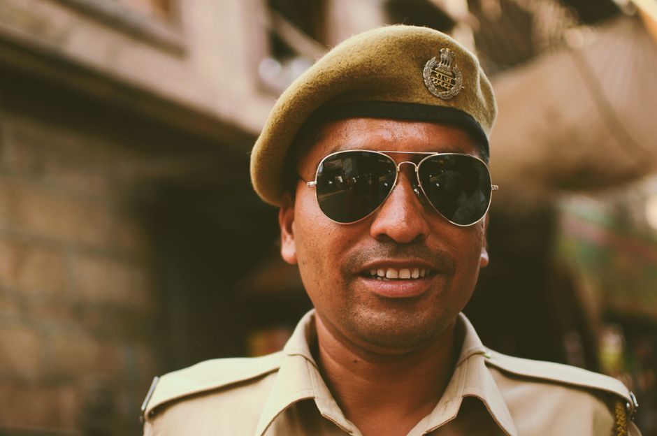 A friendly Chilean Carabineros police officer in uniform, representing safety and assistance for travelers in Chile.