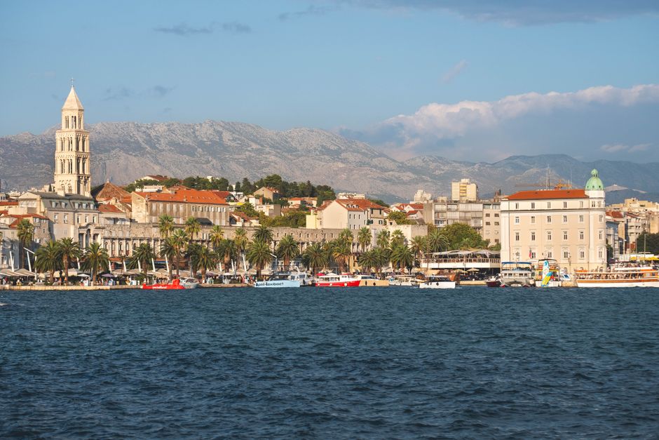 Traveler using a smartphone for navigation in the historic city of Split, Croatia