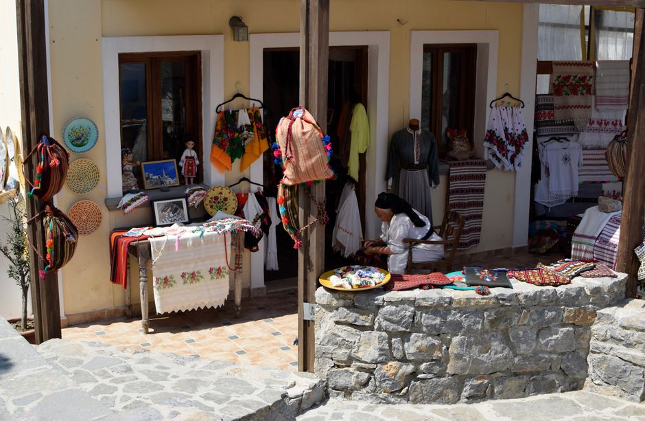 Colorful market stalls in Croatia displaying local souvenirs and crafts