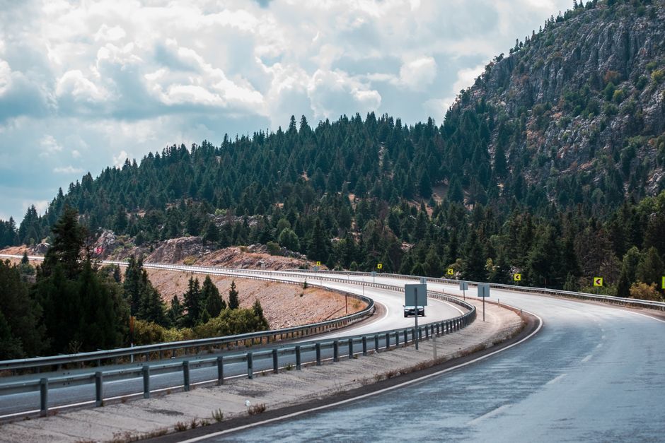Scenic road winding through the Troodos Mountains in Cyprus, ideal for a day trip