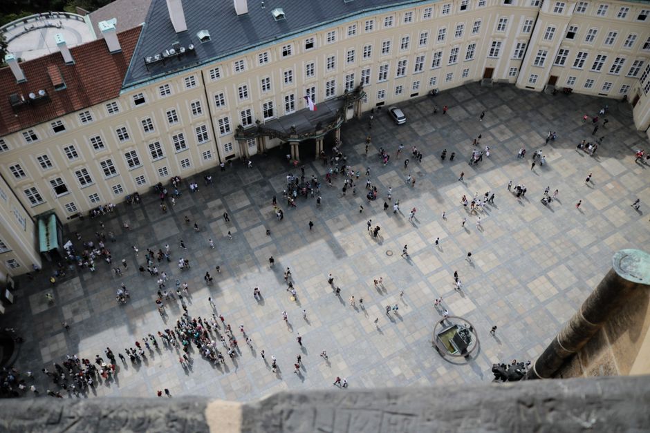 Historic Old Town Square in Prague, Czech Republic, bustling with tourists