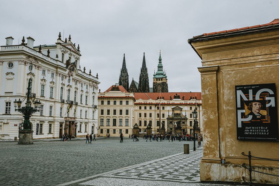 Historic Old Town Square in Prague, Czech Republic, bustling with tourists