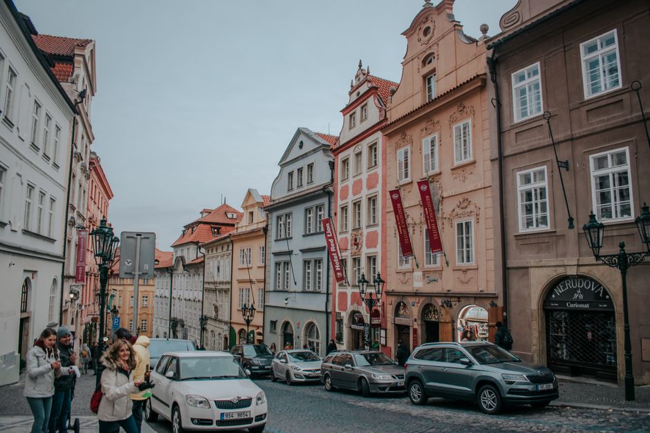 Suitcase on cobblestone street in Prague, Czech Republic, ready for travel