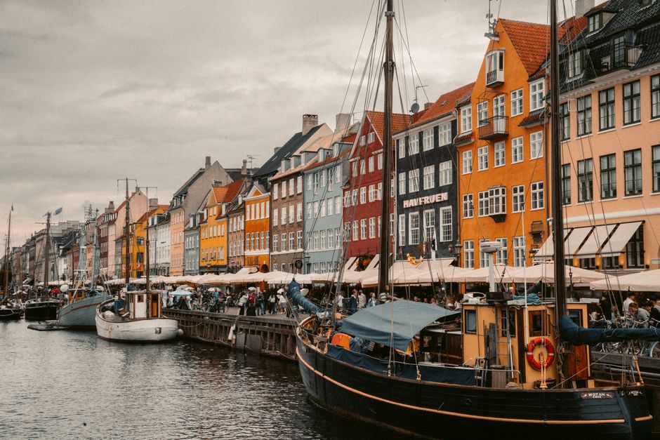 Colorful houses along Nyhavn canal in Copenhagen, Denmark, a perfect starting point for day trips