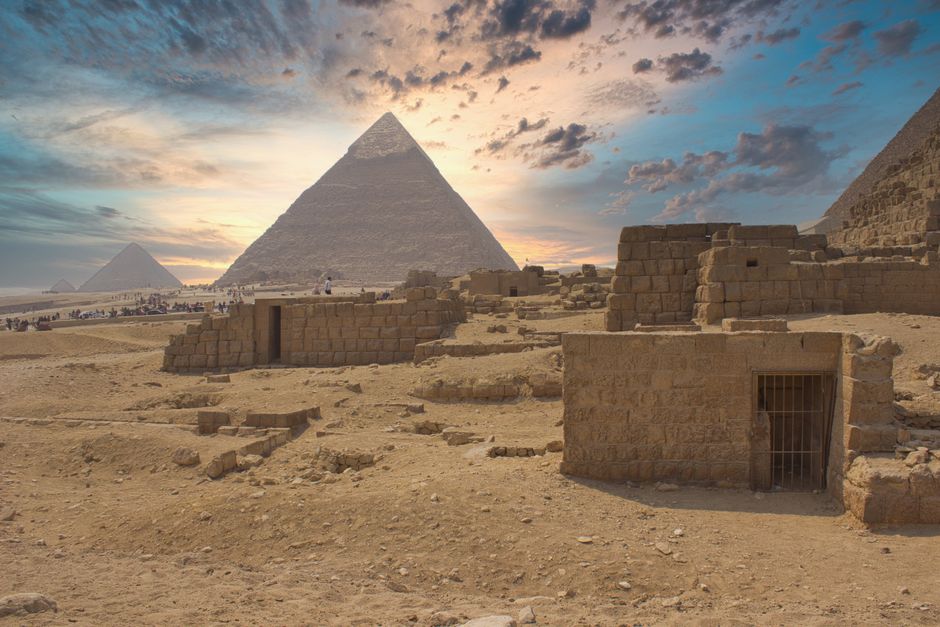 Sunrise over the Giza Pyramids Complex and Sphinx in Egypt