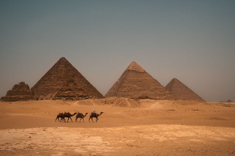 Panoramic view of Egypt's diverse landscapes, featuring ancient ruins and desert