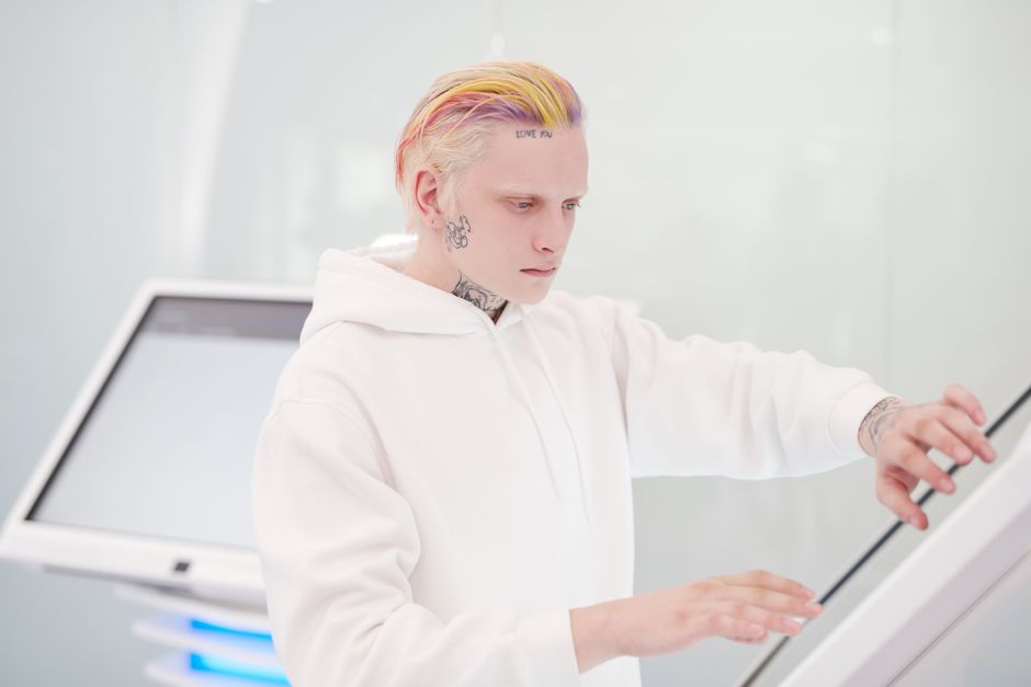 Traveler buying a prepaid SIM card at an R-Kiosk convenience store in Estonia