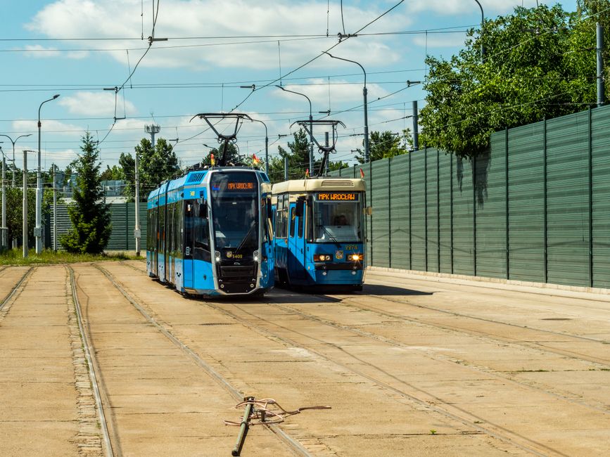 Modern tram in Tallinn, Estonia, passing by historic buildings