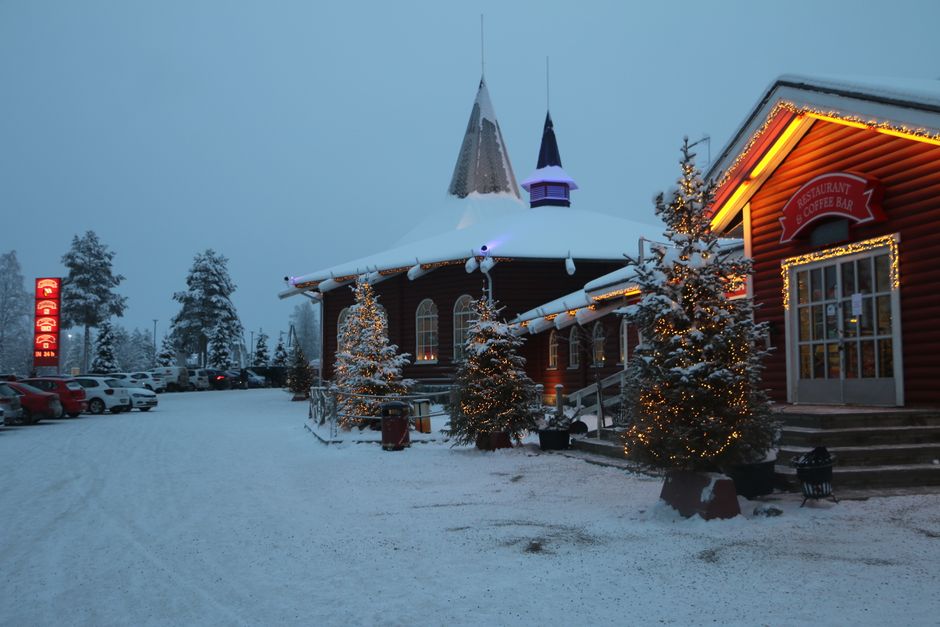 Santa Claus Express night train traveling through snowy Finnish landscape towards Rovaniemi
