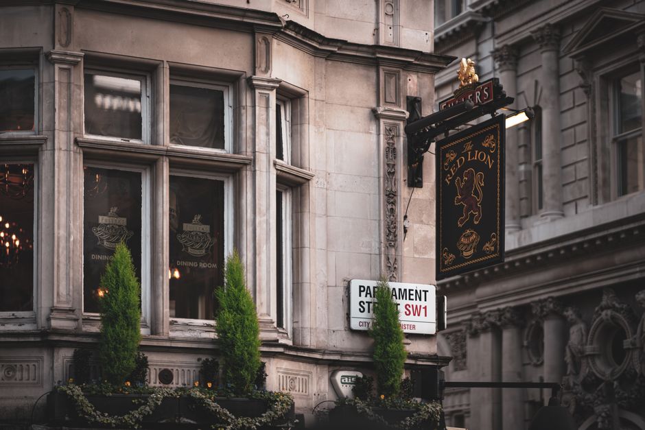 A classic British pub with people enjoying food and drinks in Great Britain