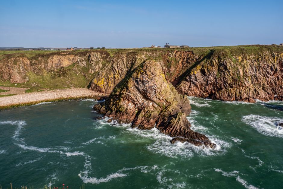Diverse landscapes of Great Britain, showcasing rolling hills, lakes, and coastlines