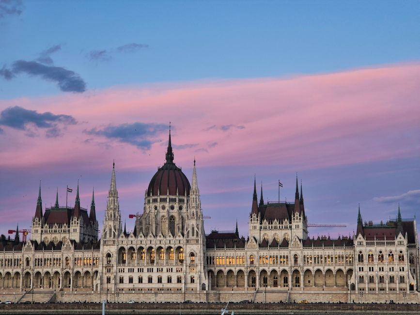 Hungarian Parliament Building illuminated at dusk in Budapest