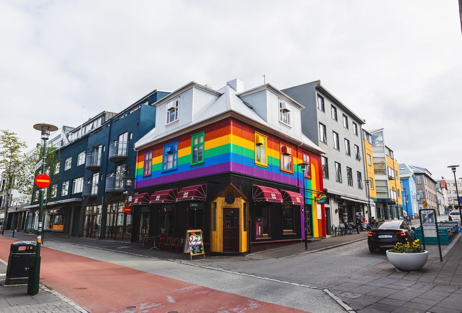 Bustling Laugavegur shopping street in Reykjavik, Iceland with colorful buildings and people