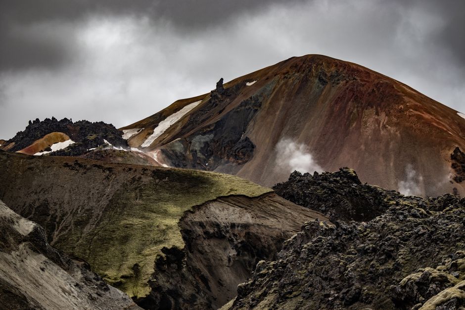 Dramatic Icelandic landscape with changing weather, clouds, and mountains