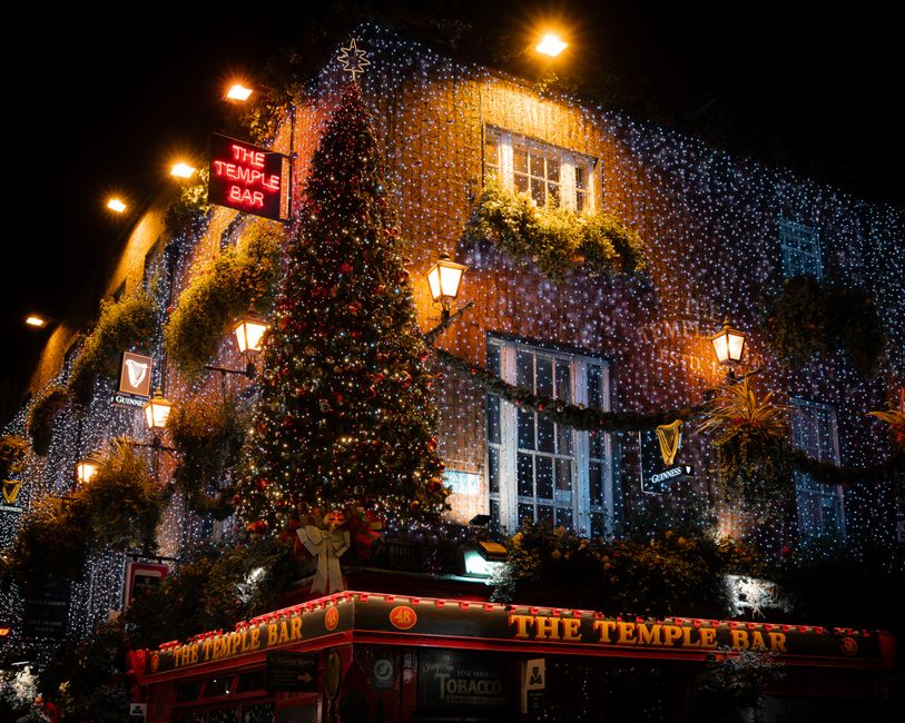 A charming traditional Irish pub exterior in Dublin, Ireland, with flowers and a welcoming atmosphere