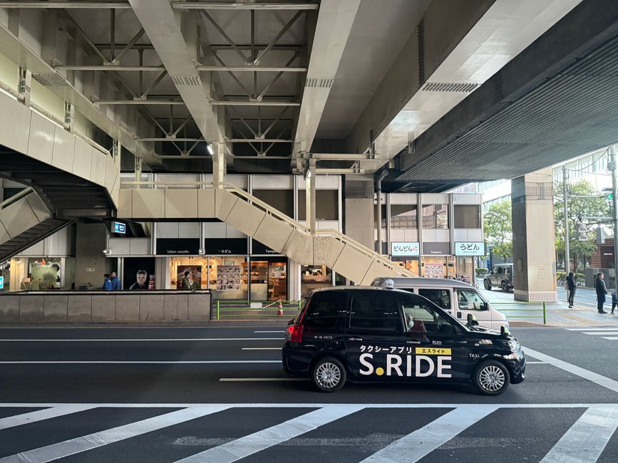 A police Koban station in a busy Tokyo street, Japan