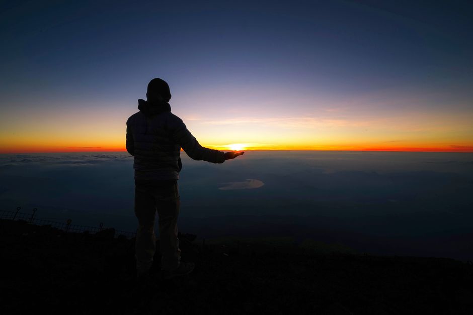 Traveler enjoying a beautiful, serene landscape in Japan, symbolizing peace of mind with travel insurance