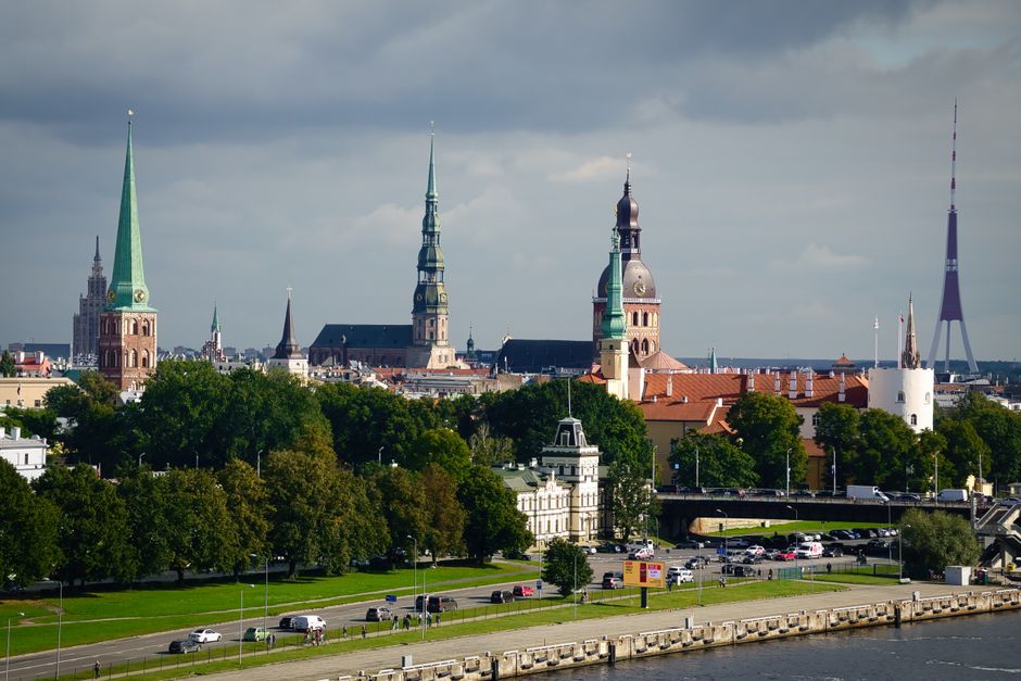 Tour group exploring historic Riga Old Town in Latvia