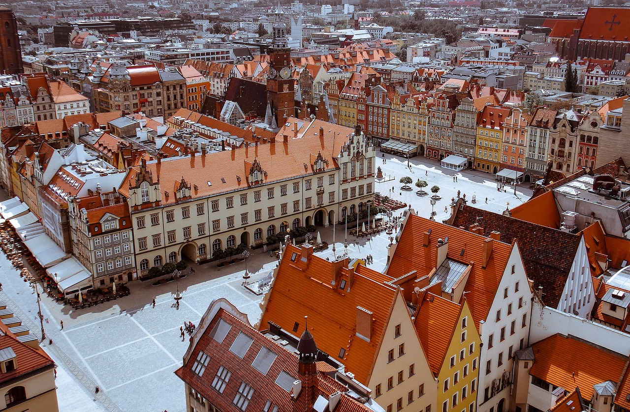 Historic street in Riga Old Town, Latvia, with people enjoying their travels