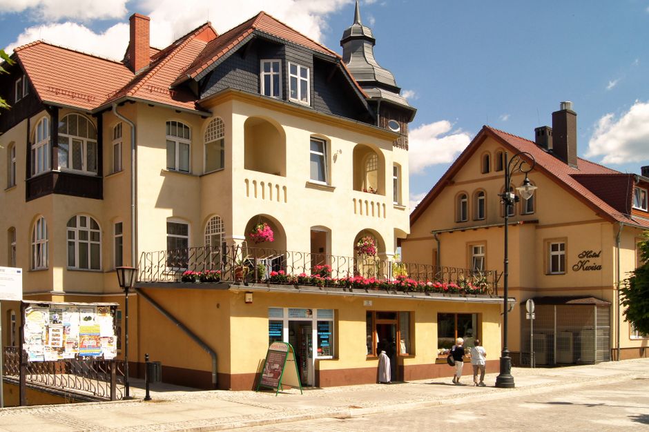 A charming street in Vilnius Old Town, Lithuania, with boutique hotels and cafes