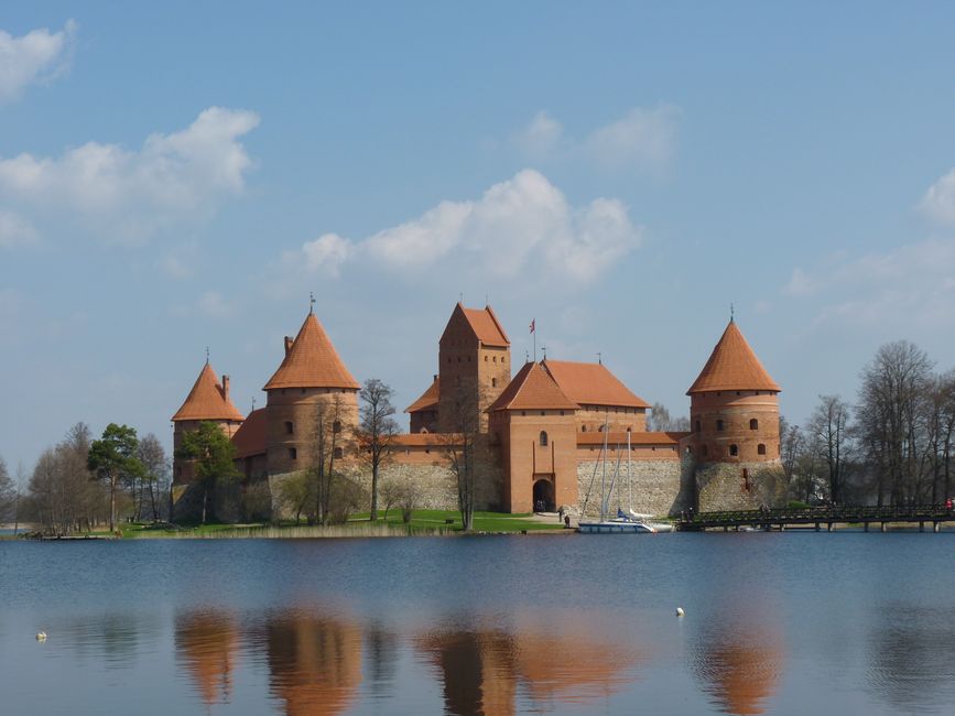 Traveler holding a Lithuanian prepaid SIM card package