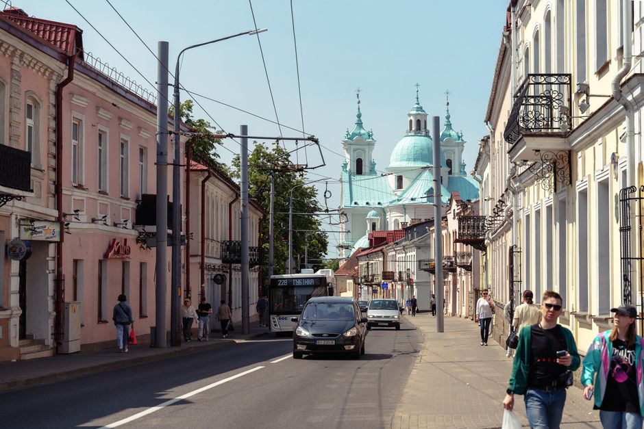 Sunny summer day in Vilnius, Lithuania with people enjoying outdoor cafes
