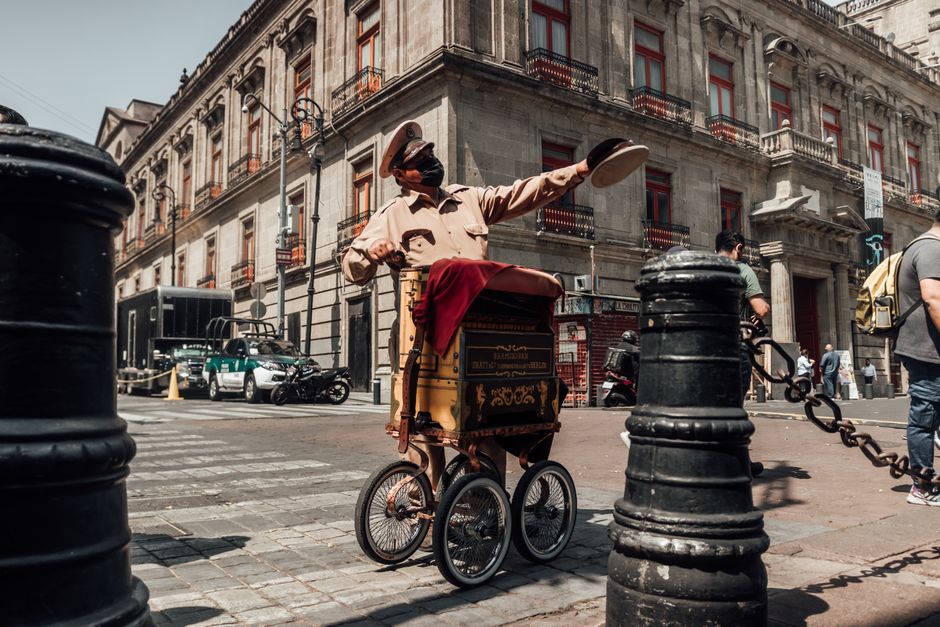 Vibrant street scene in Mexico City with historic architecture and people
