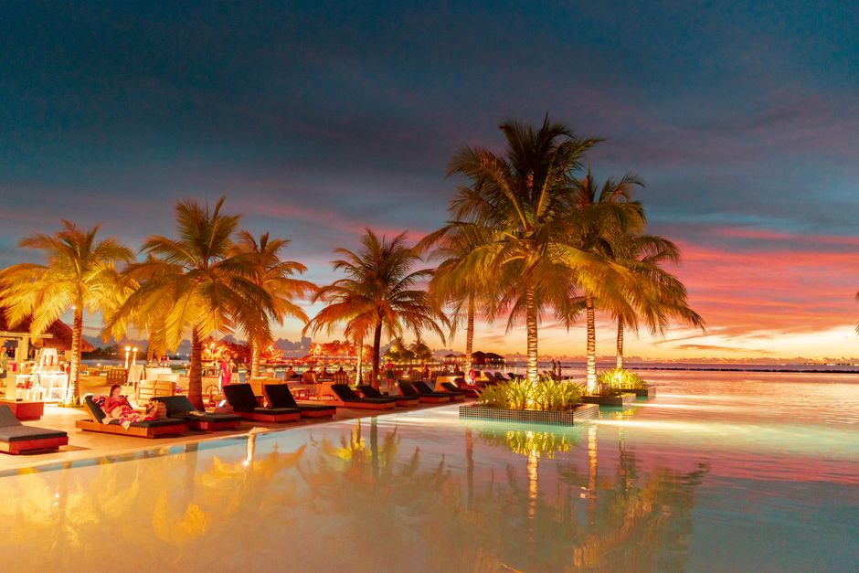 Luxury all-inclusive resort in Riviera Maya, Mexico with palm trees and ocean view