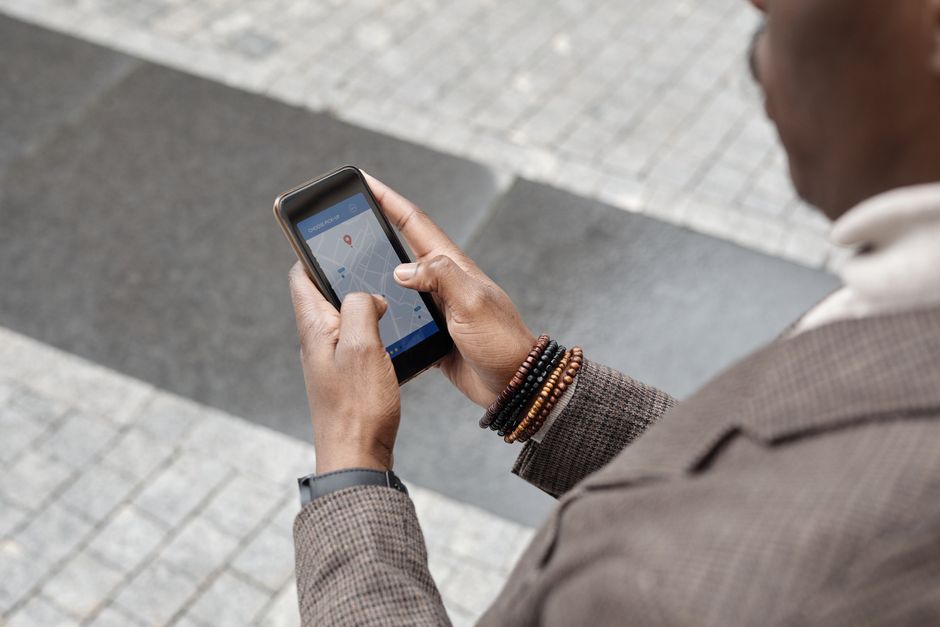 Tourist using a smartphone for navigation in Mexico City